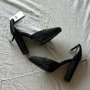 Express rhinestone pumps